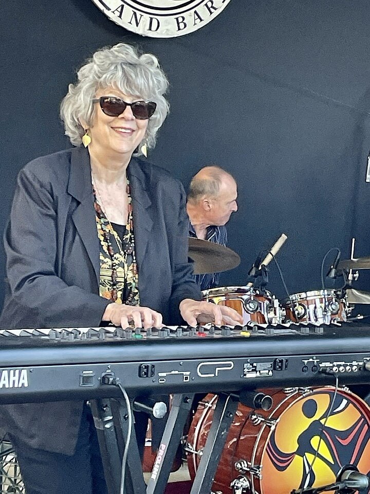 Caroline Dahl performing at Flower Piano in Golden Gate Park, San Francisco 2019